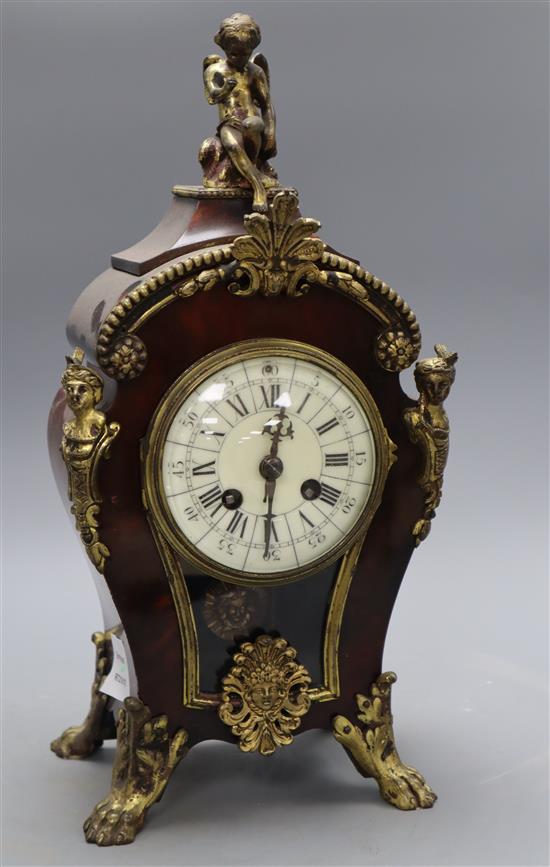 A Louis XVI style tortoiseshell and ormolu mantel clock height 37cm